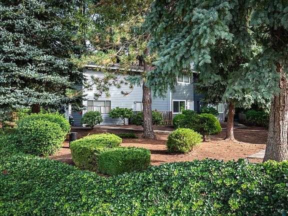 The Hideaway | Exterior Building with Mature Landscaping