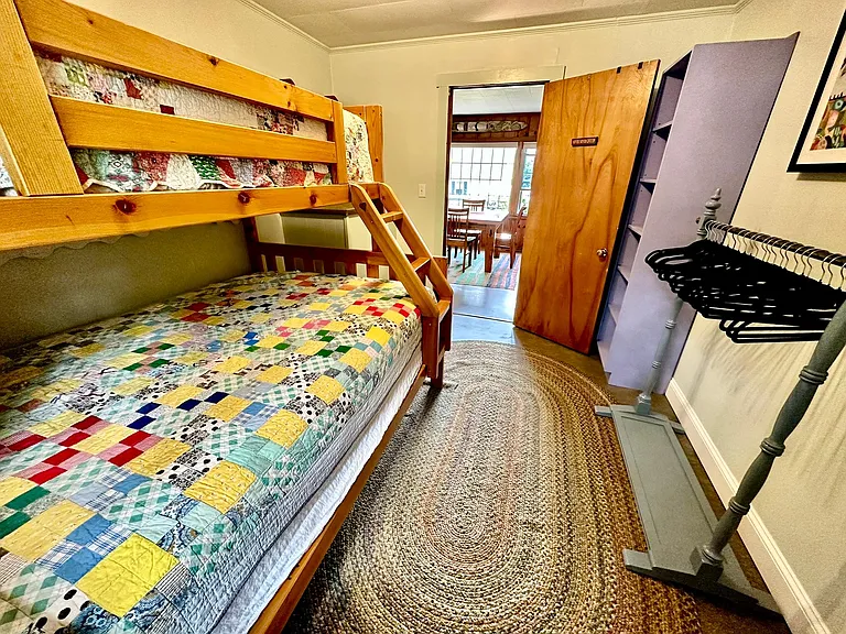 The bunk bed room is off the dining room area.