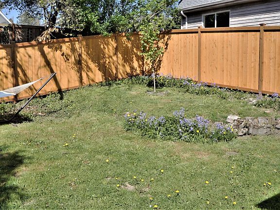 Back yard - hammock to stay as part of rental.