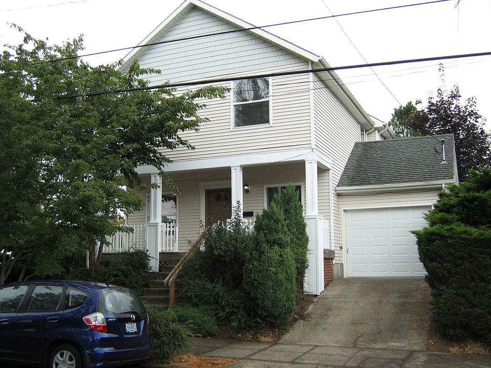Front of unit, with attached garage (has door opener)