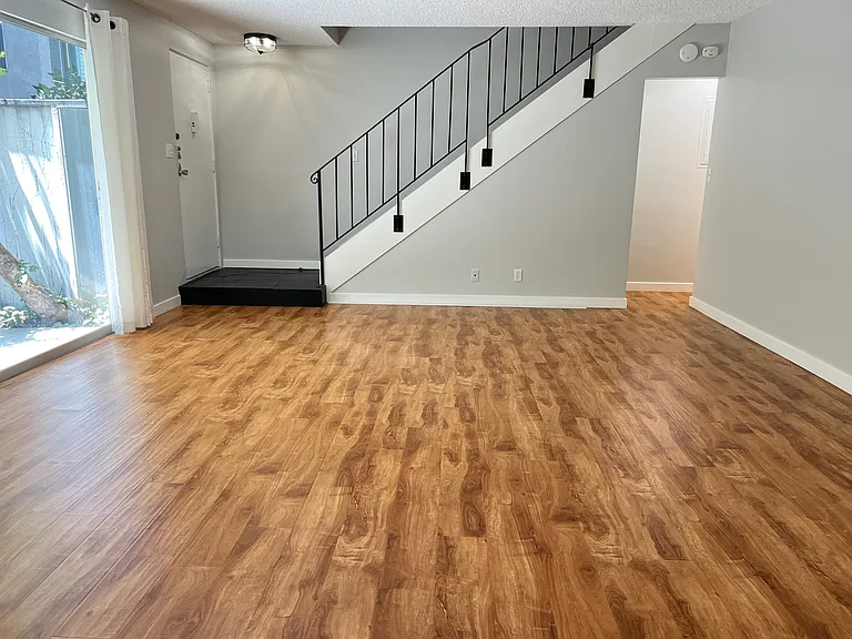 Living room w/doorway to guest bathroom
