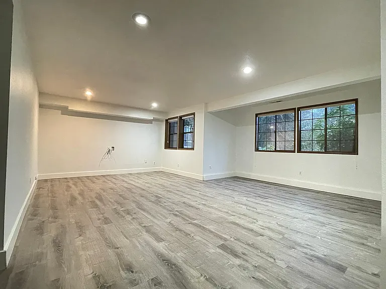 Spacious lower-level living room/recreation area