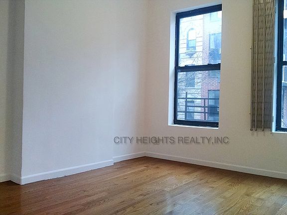 5th image of 211 E 10th St APT 8