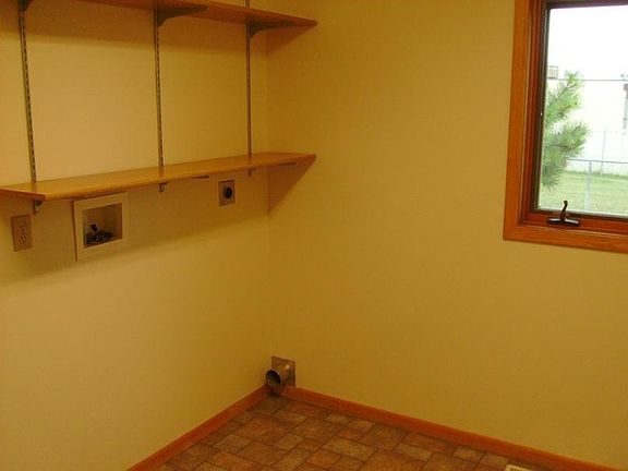 Laundry room with washer and dryer hookups