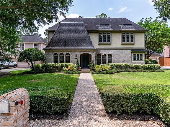 Champion Forest subdivision is loved for its large lots and beautiful architecture. This home is not far from Brill Elementary.