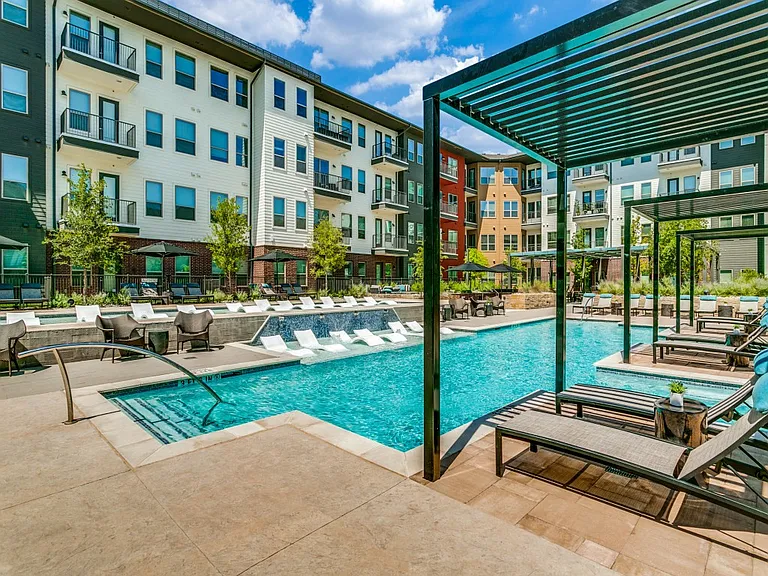Resort-style pool with luxurious cabanas
