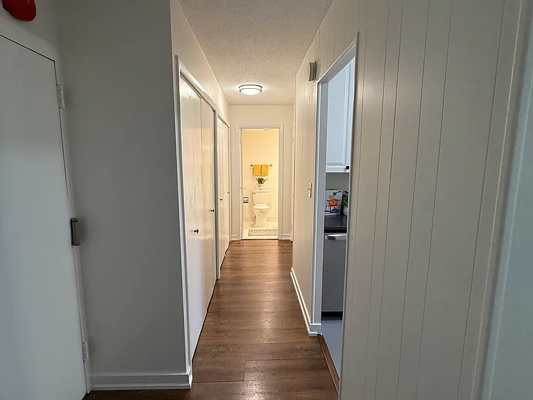 Hallway to bedroom and bathroom