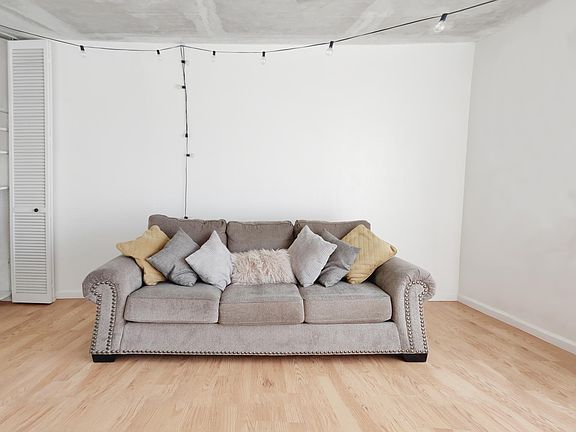 Living Room, with updated raw concrete ceiling