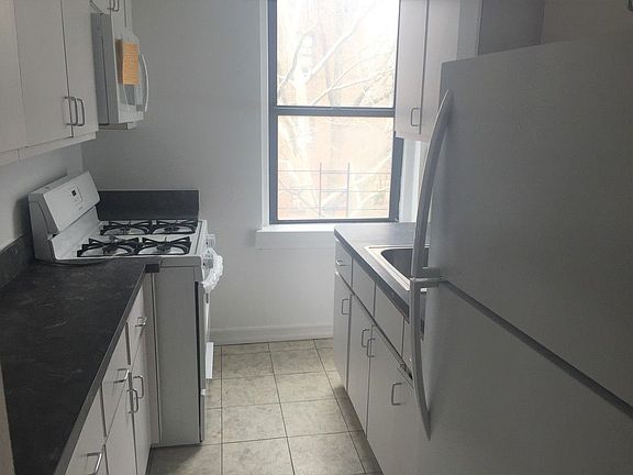 2nd image of 6120 Woodside Ave APT 2D