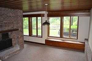 living room with two sided fireplace