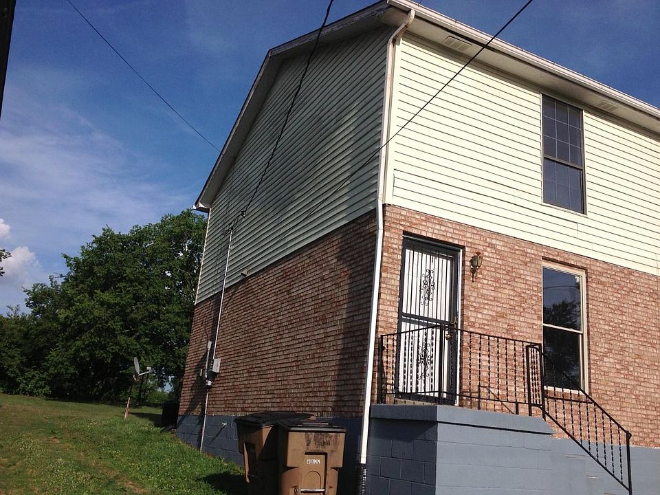 Front of home on rapidly changing street off of Cahal. Lots