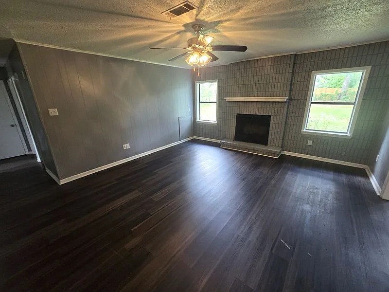 Spacious 4-Bedroom Home with Fireplace & Private Primary Suite — Photo 2