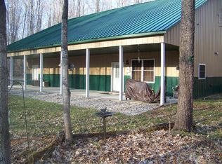 11290 Woodside Dr, Elmira, MI 49730