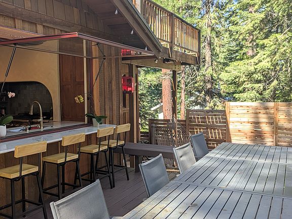 Indoor-outdoor kitchen and bar