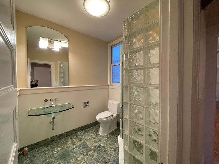 Full Bathroom At Front of Unit