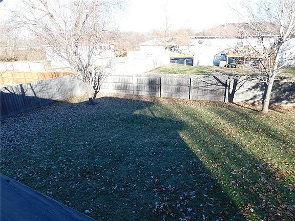 Treed Fenced Backyard w/6ft wood privacy fence