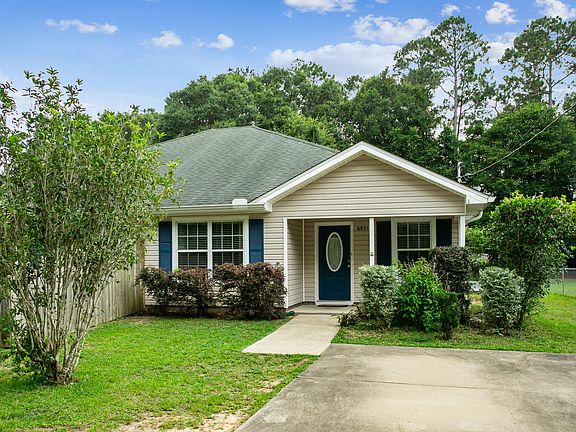 Duplex Property with Privacy fence in front.