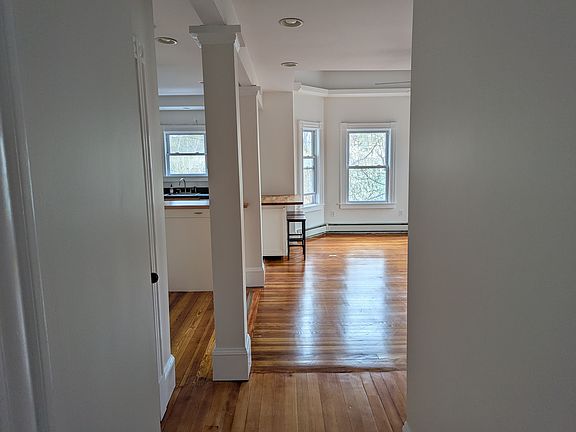 View from main hallway looking into the living/dining area