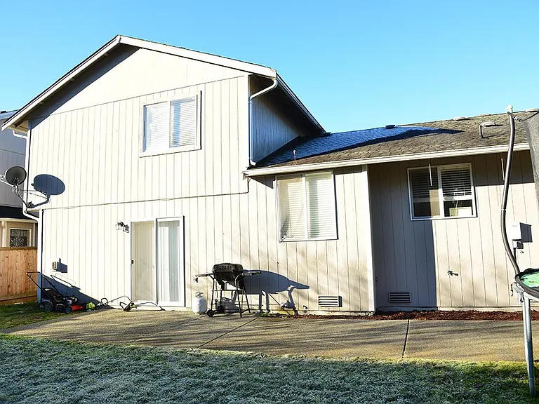 Back of house . Sliding doors go into family room