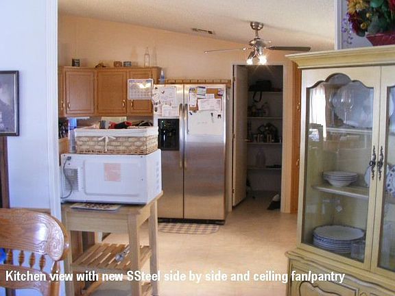 kitchen w stainless steel side by side