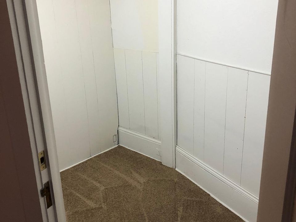 large walk in closet area that can also accommodate a dresser or additional rolling rack
