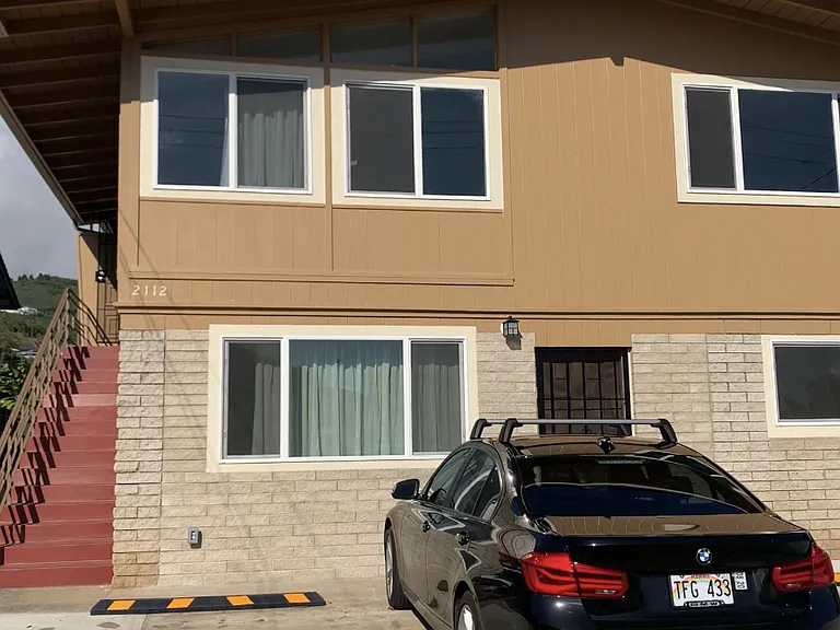 Front view of the building, entire 2nd floor 3-bedrooms and 2-bathrooms