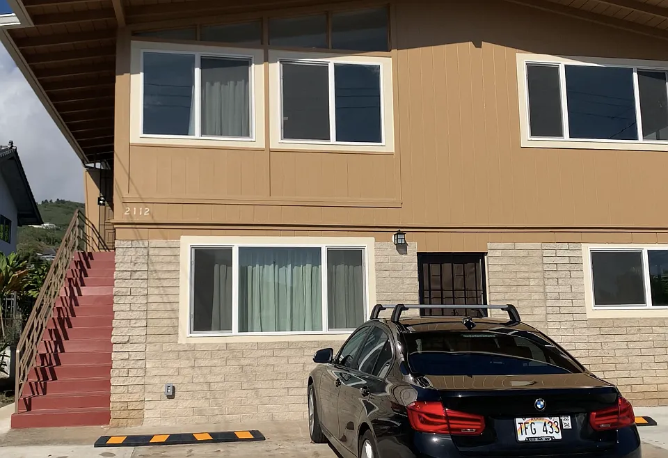 Front view of the building, entire 2nd floor 3-bedrooms and 2-bathrooms
