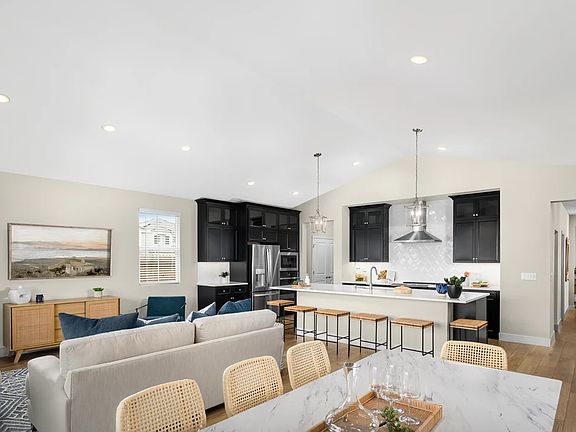 Dining area with vaulted ceiling