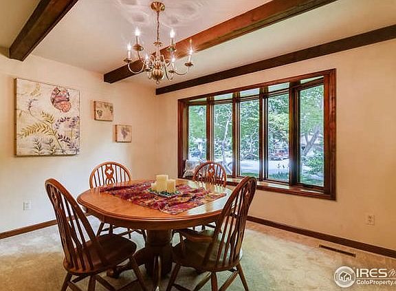 Formal dining room with beautiful newer bow window