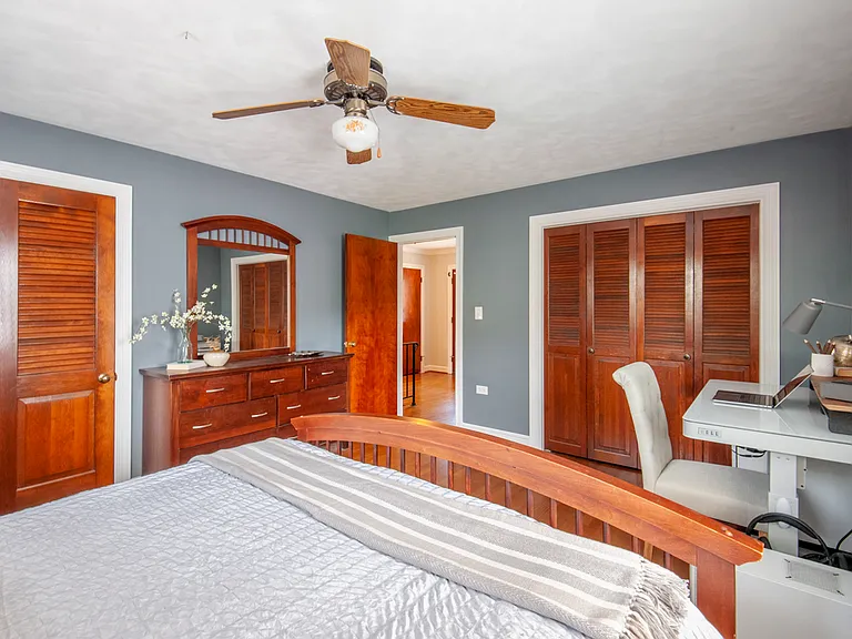Master bedroom with two separate closets
