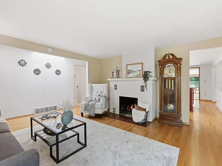 Open living and dining flow with abundant natural light
