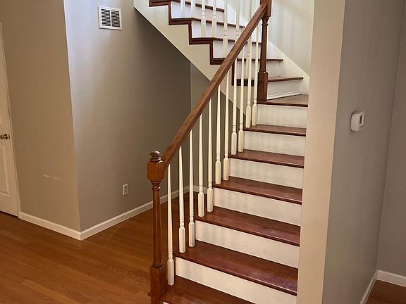 Stairs from living room to upper level.