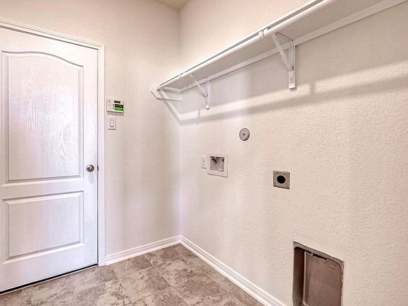 Dedicated laundry room with full-size washer and dryer included for your convenience.