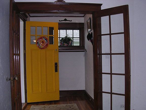 Looking through French doors to front foyer