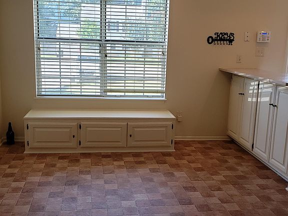 Kitchen window seat and extra storage .