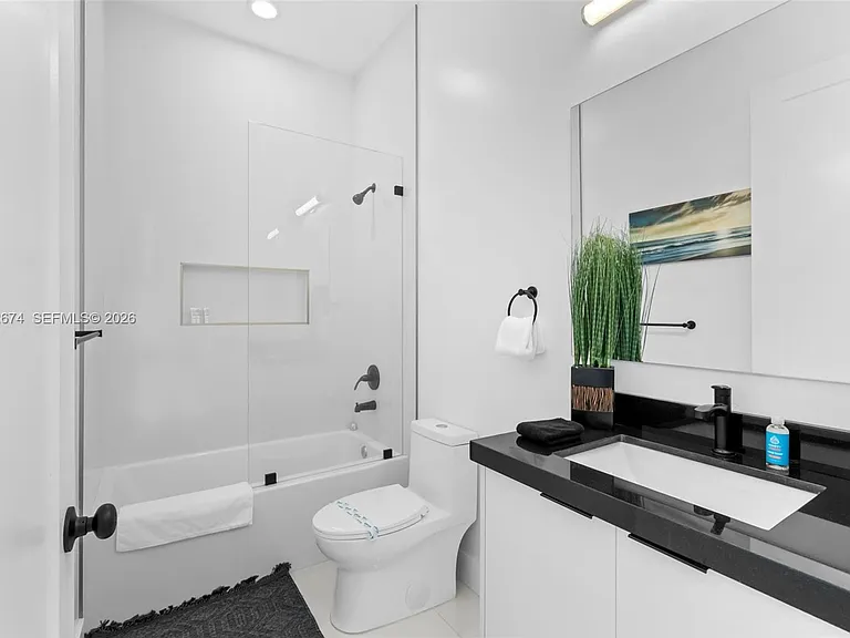 2962 NW 10th Ct — Photo 40
