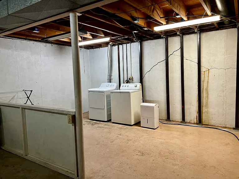 Basement unfinished area with washer and dryer