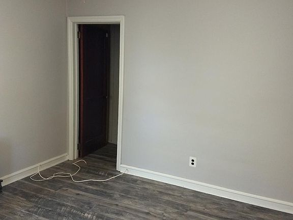 rear bedroom leads to full unfinished attic