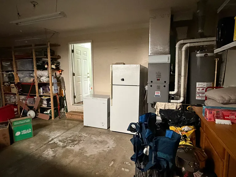 garage and brand new high efficiency gas furnace and water heater