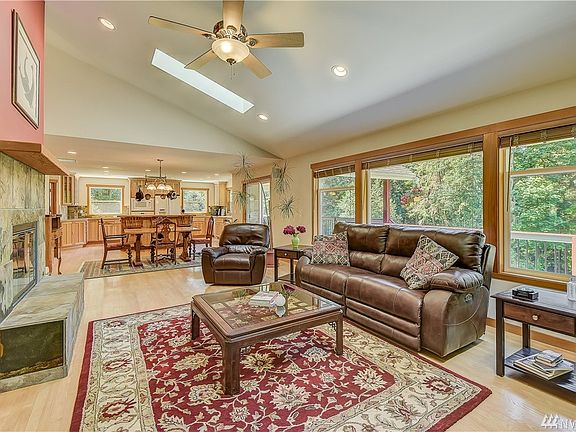 A wall of windows brings the serene outdoors in.
