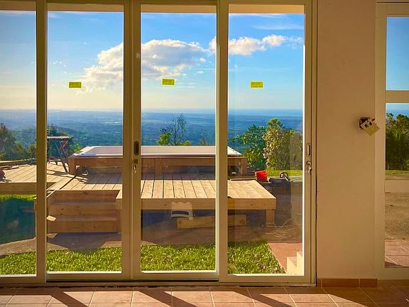 Windows in the living area. Just replaced by a wall of glass