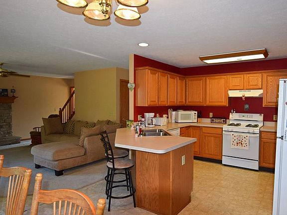 Another look of kitchen and living room from eat-in kitchen.