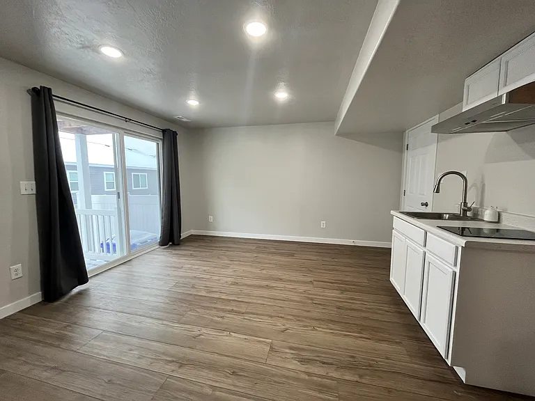 Basement living room area with daylight