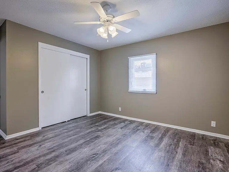 Large bedroom in a unit at Ashland Park Apartments.