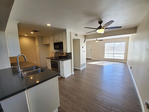 View from dining area of kitchen and living room