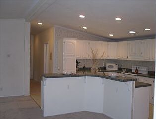 Kitchen with abundance of cabinets and counter space.