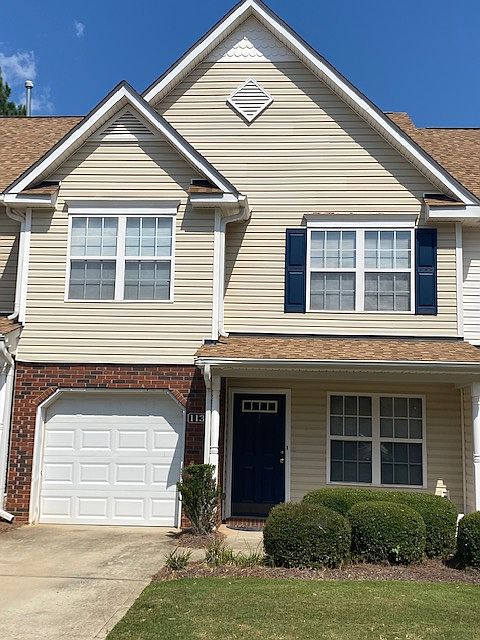 front - one car attached garage plus a driveway for parking.