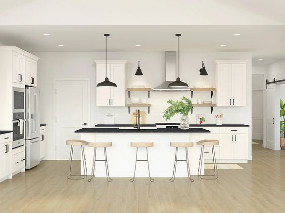 Kitchen with pendant lighting and floating shelves