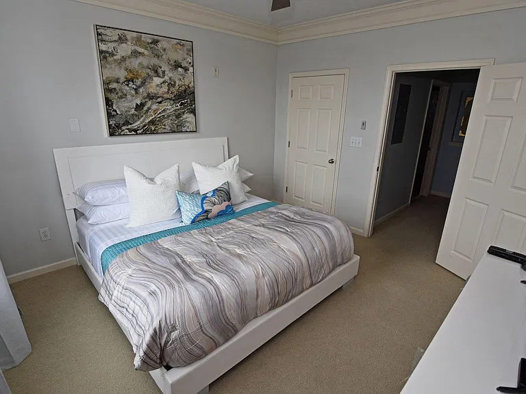 Bedroom with old carpet. Carpet was replaced