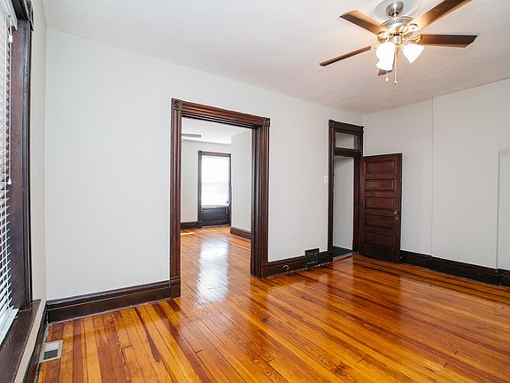 Living room, looking into the front bedroom.
